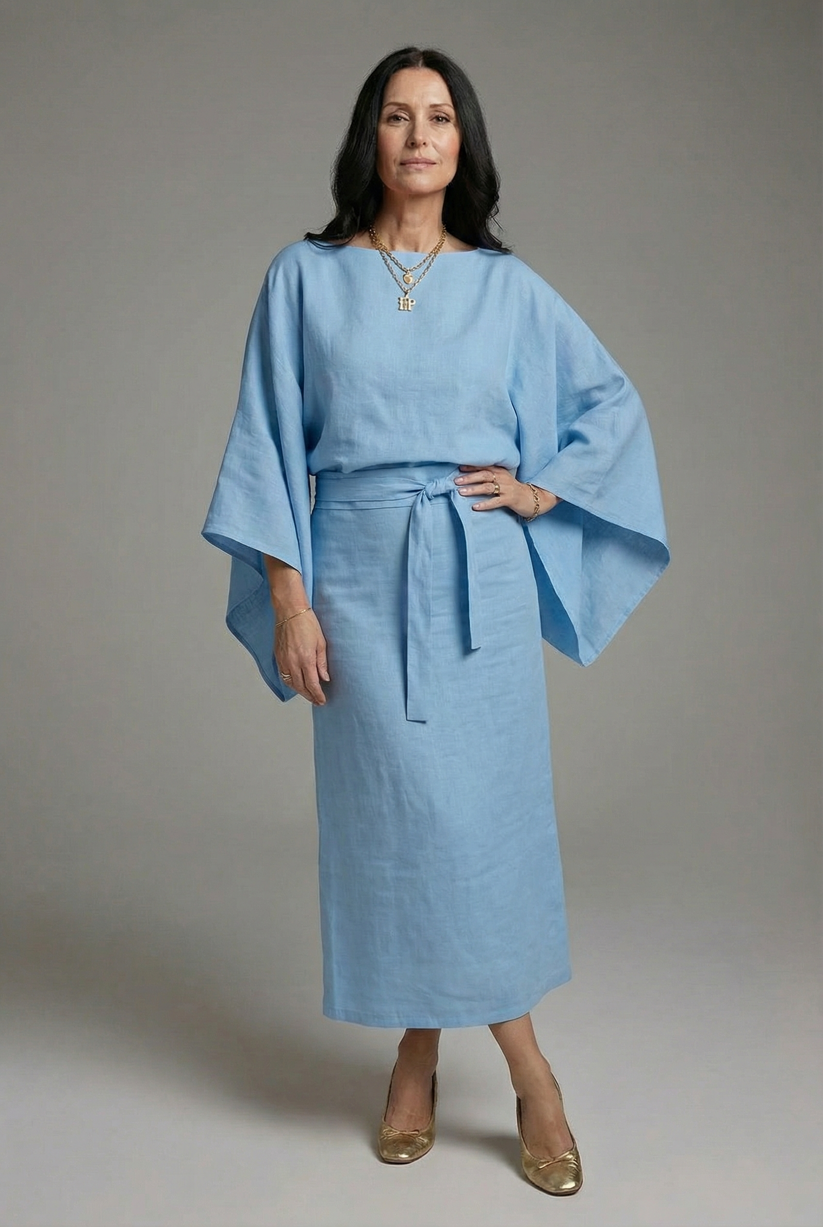 Light blue kimono midi dress with tie waist and wide sleeves, round neckline.