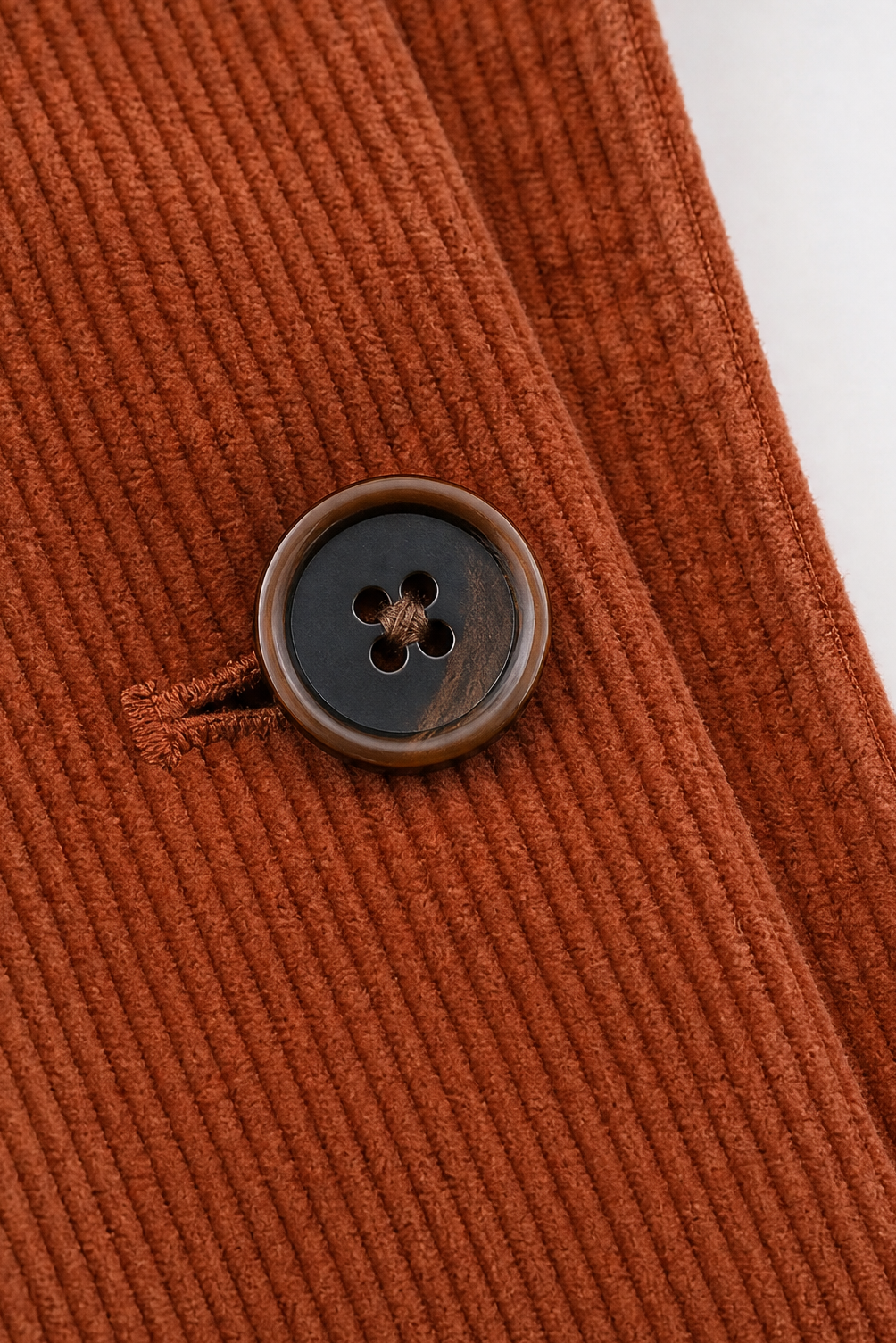 Rust-orange corduroy-look jacket button front close-up