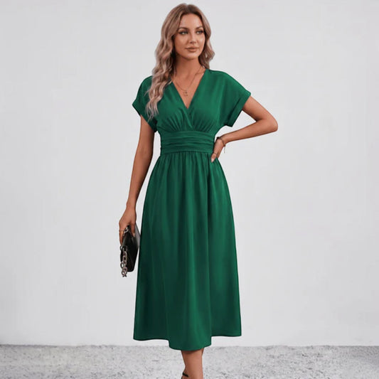 Green midi fit-and-flare dress with V-neck, ruched waist, and short sleeves
