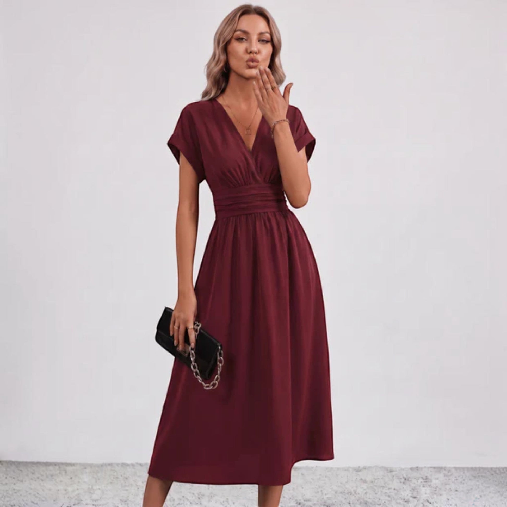 Burgundy V-neck fit-and-flare midi dress with ruched waist and short sleeves
