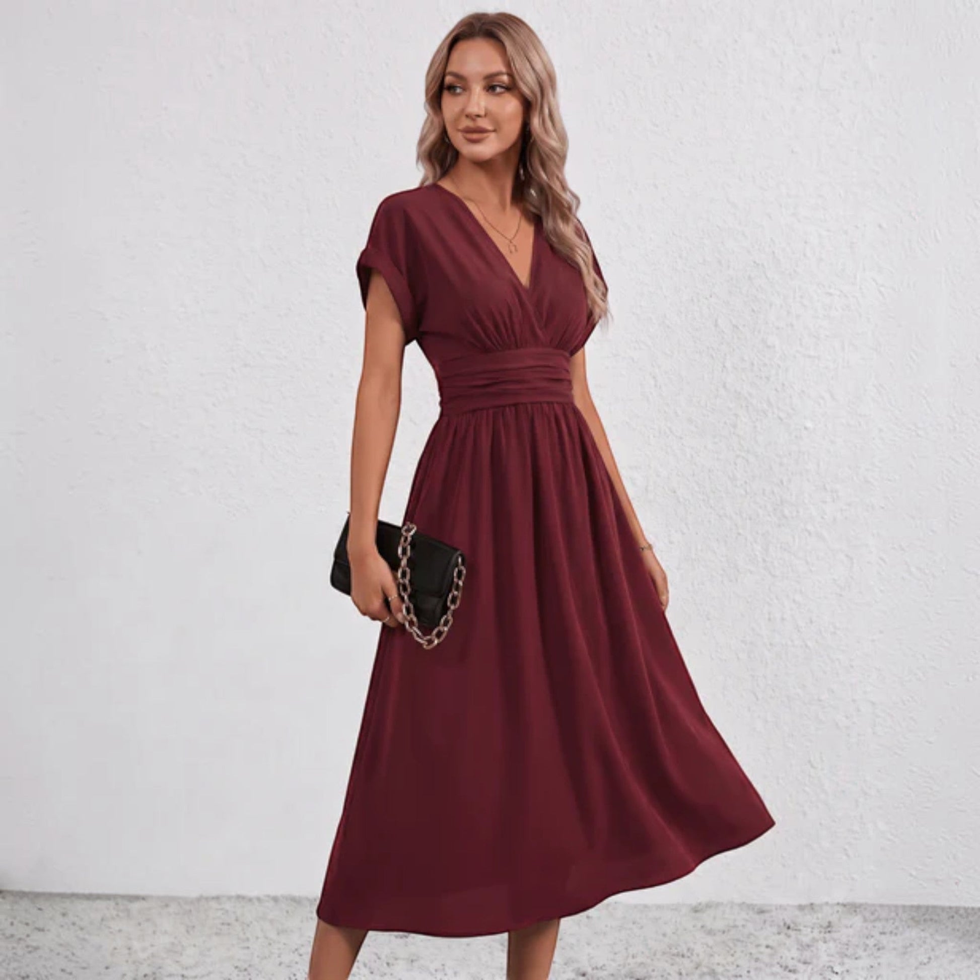 Burgundy V-neck ruched-waist midi dress with short sleeves and flared skirt
