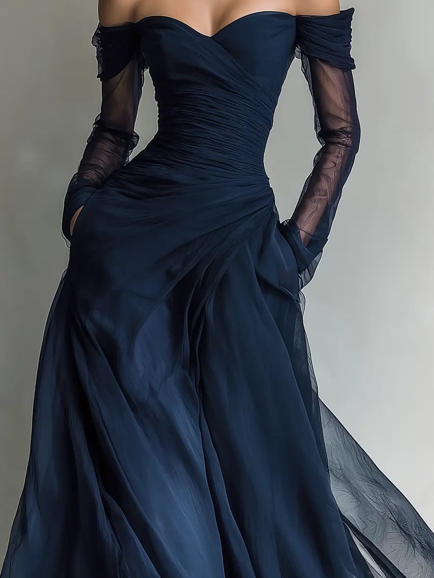 Fitted dark blue chiffon off-shoulder maxi dress with ruched waist and sheer long sleeves