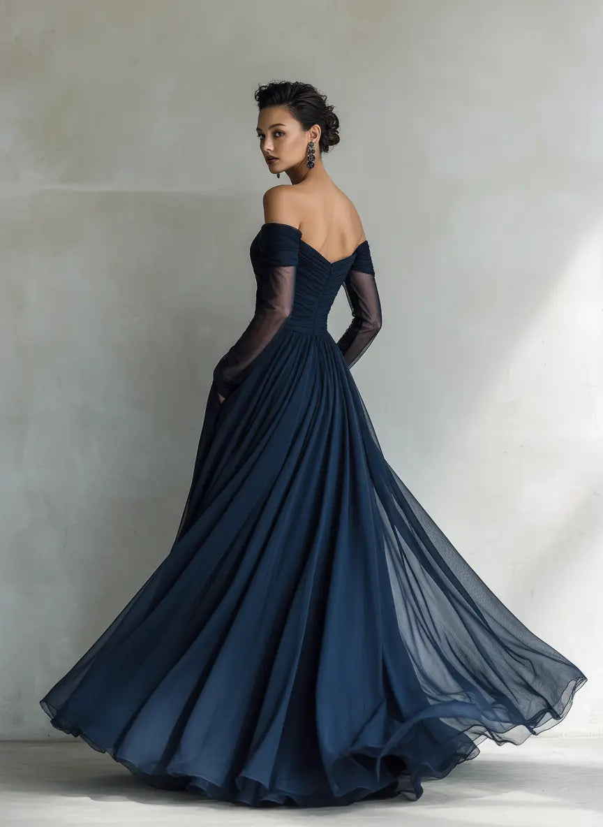 Fitted dark blue chiffon off-shoulder maxi dress with full pleated skirt and sheer sleeves