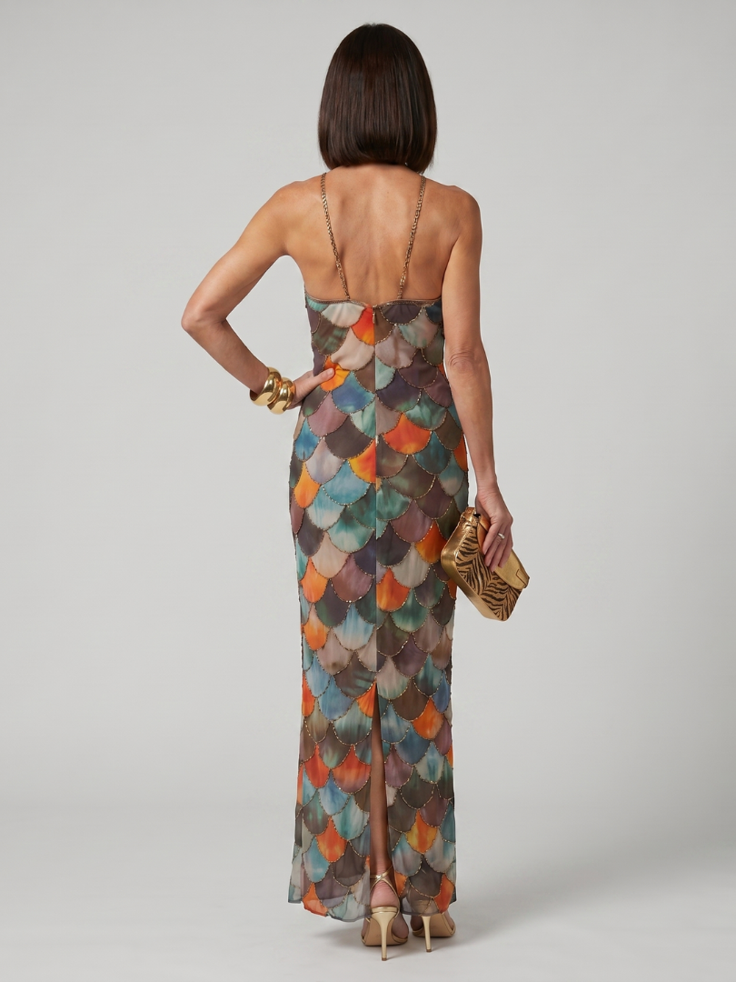 Fitted maxi dress with open back and multicolor scale print, halter straps