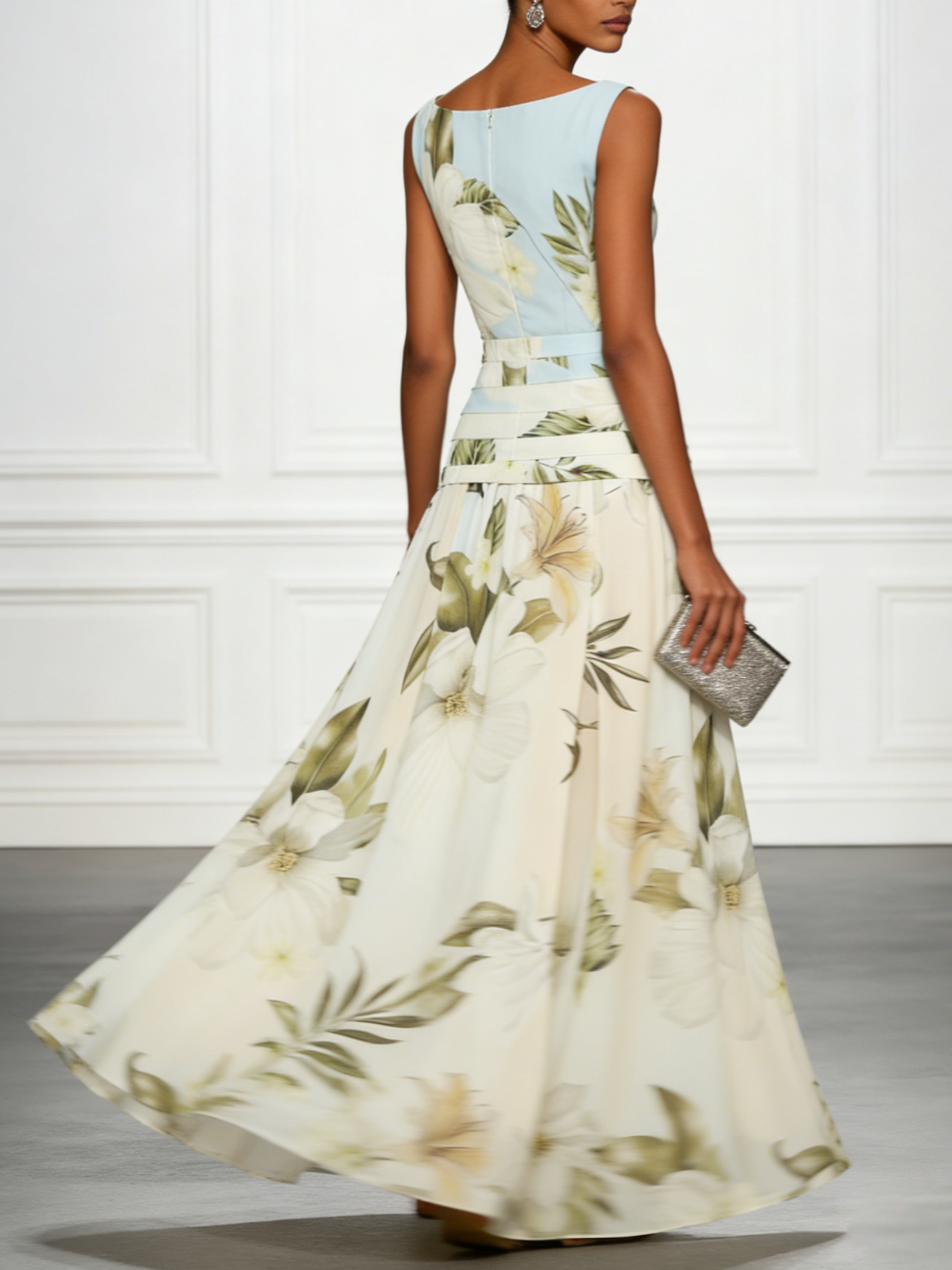 Light cream floral sleeveless maxi dress, boat neck, fitted waist with layered drape detail.