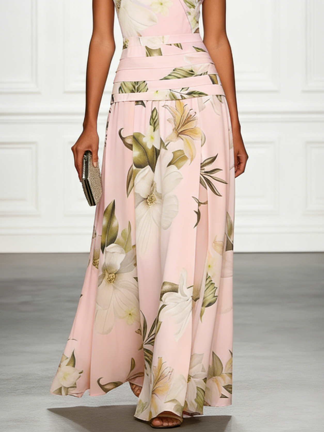 Pink floral boat-neck sleeveless maxi dress with tiered waist and flowing wide hem skirt.