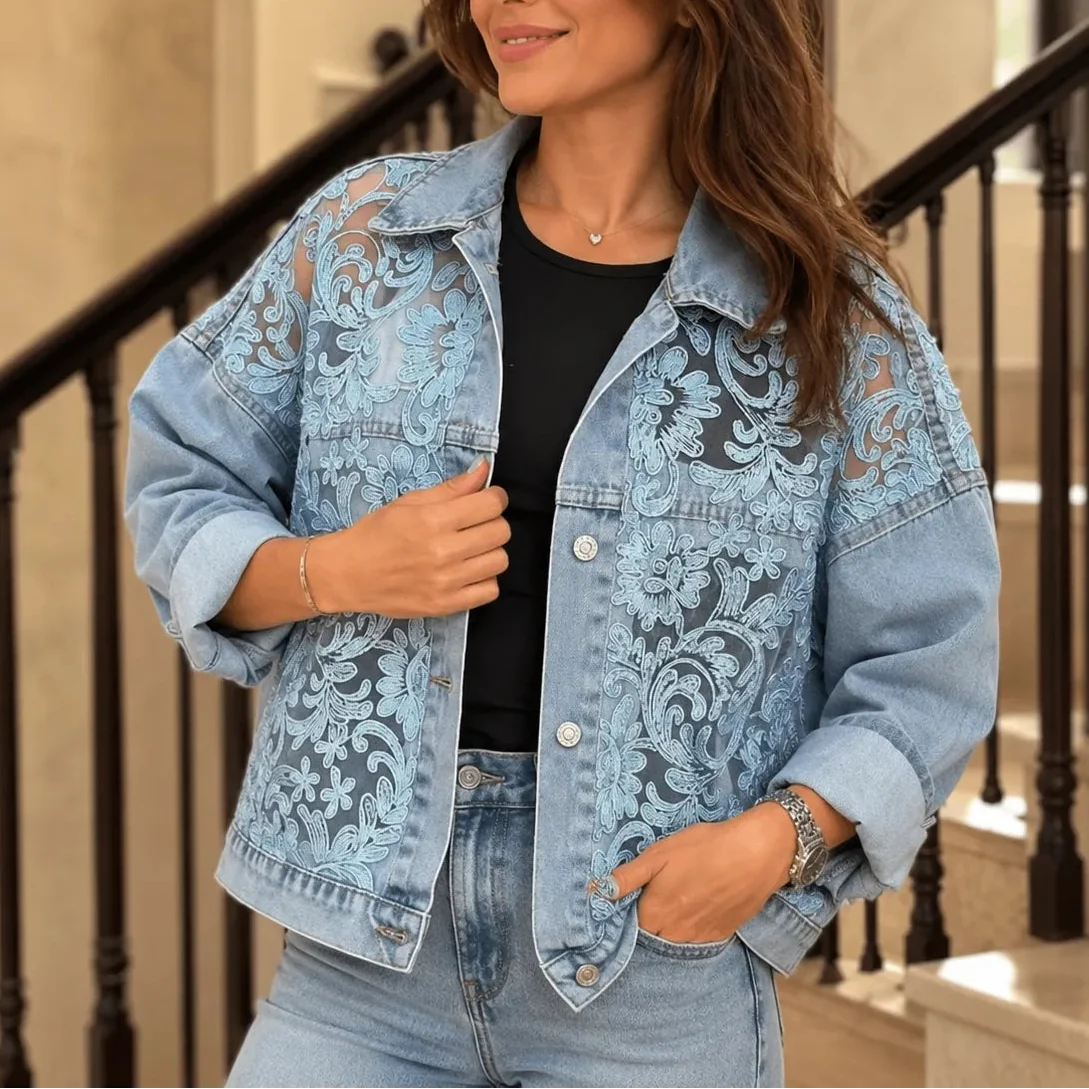 Light blue denim jacket with lace-look floral paneling, open collar, button front