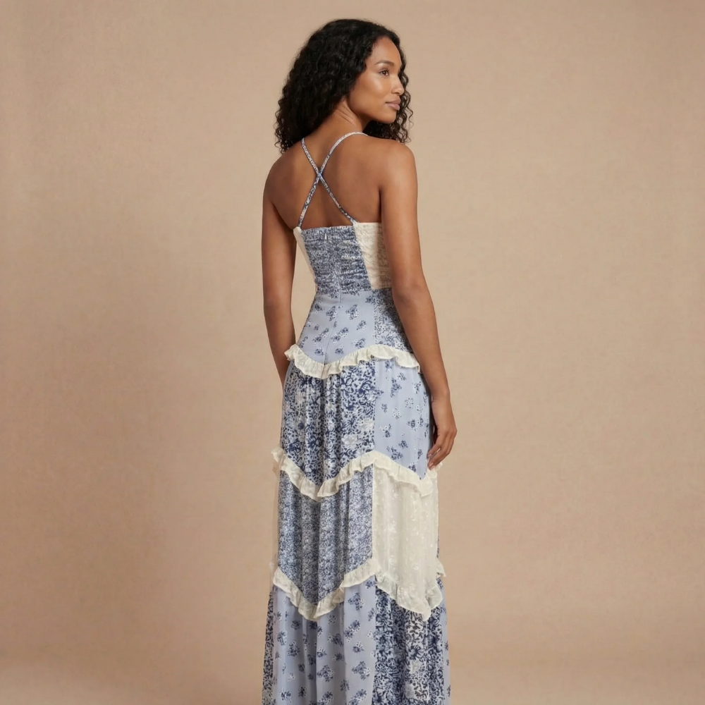 Blue floral maxi dress with crisscross back straps and lace-trim tiered ruffles