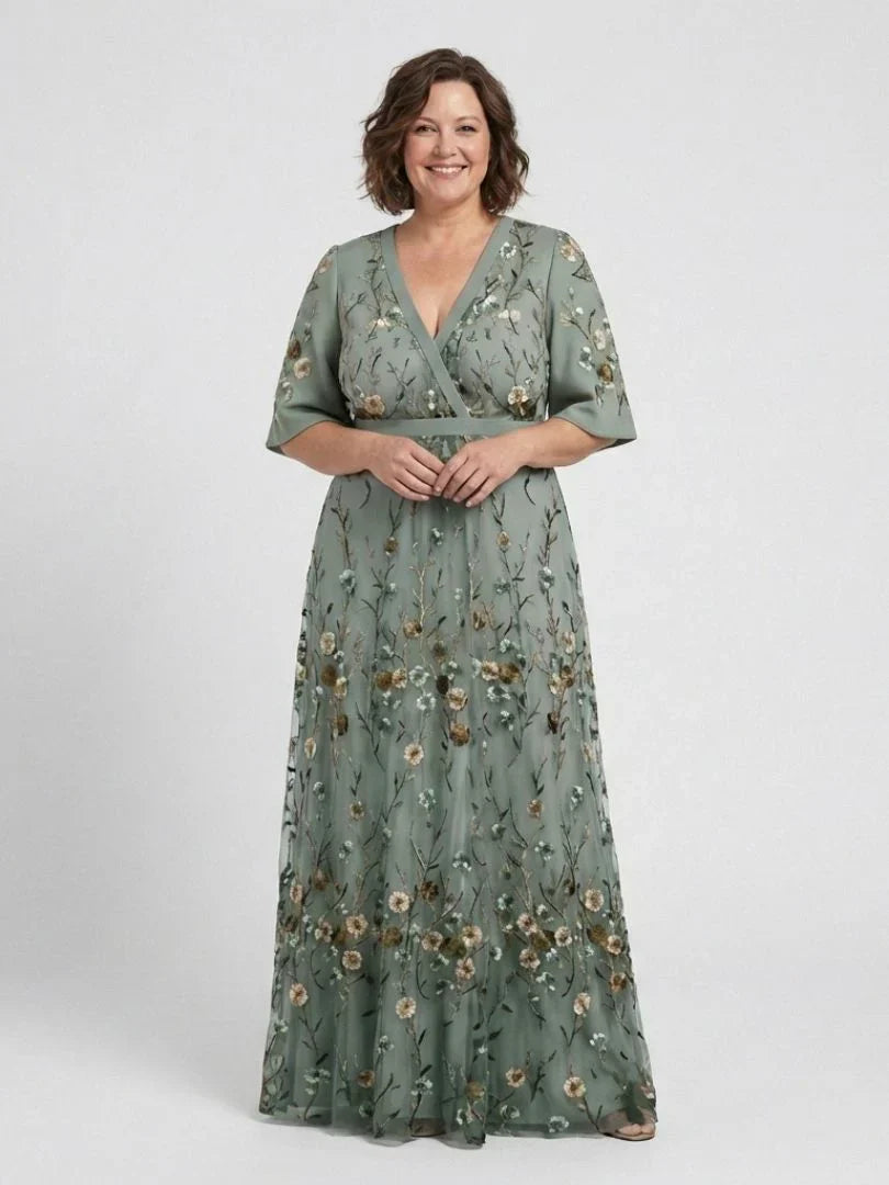 Sage green floral maxi dress with V-neck, three-quarter sleeves, and belted waist front
