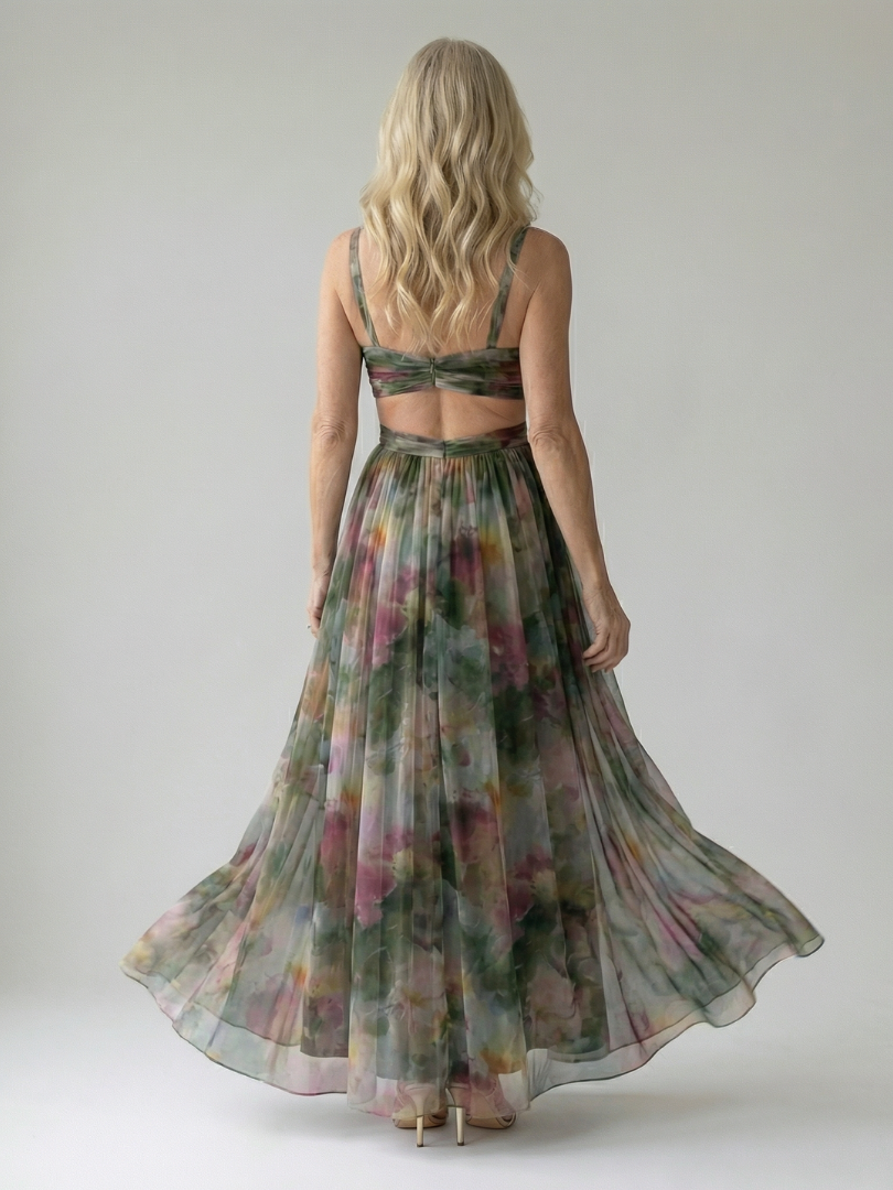 Back view of dark green multicolor wrap maxi dress with V-neck and flowing skirt