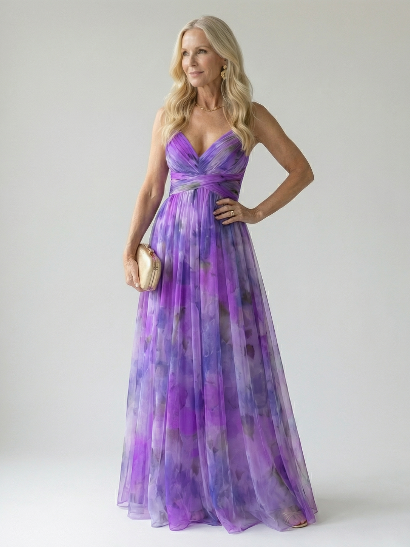 Purple wrap maxi dress with V-neck and gathered waist, flowing layered skirt
