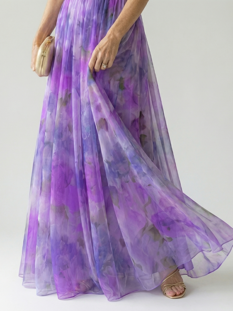 Purple wrap maxi dress with V-neck and flowing sheer skirt, draped wrap detail