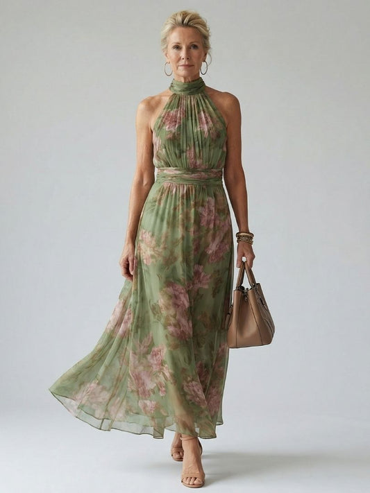 Sage green floral halter midi dress with gathered neckline and waist, flowy skirt