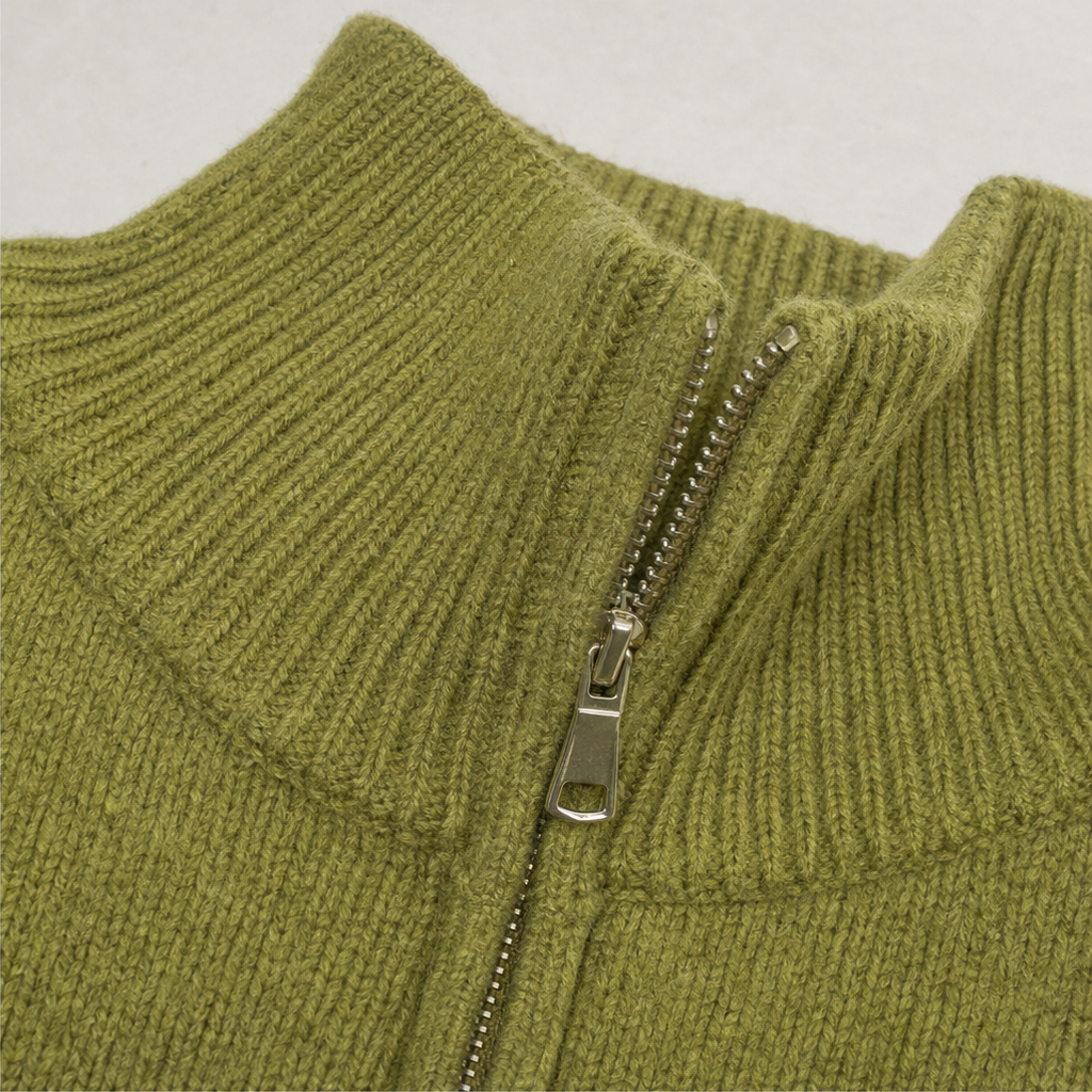 Olive green ribbed knit cardigan with centered zip and stand collar