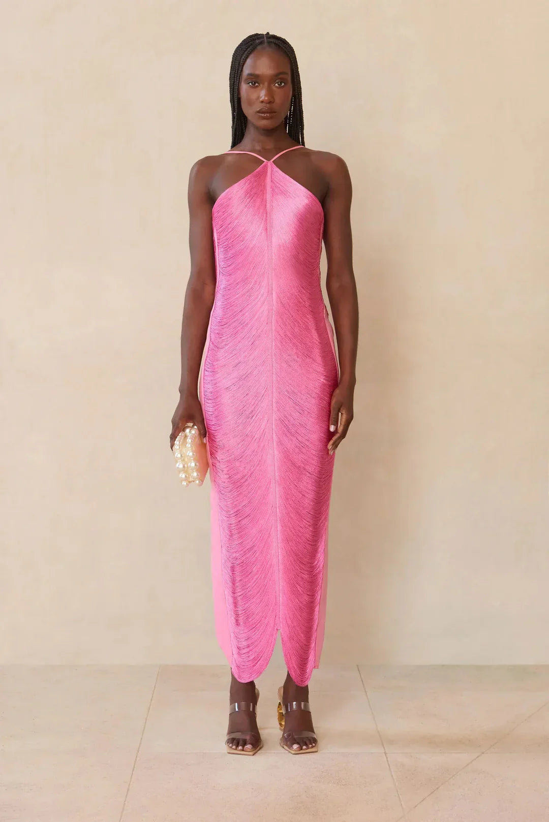 Pink halter maxi dress with halter neckline and smooth textured drape