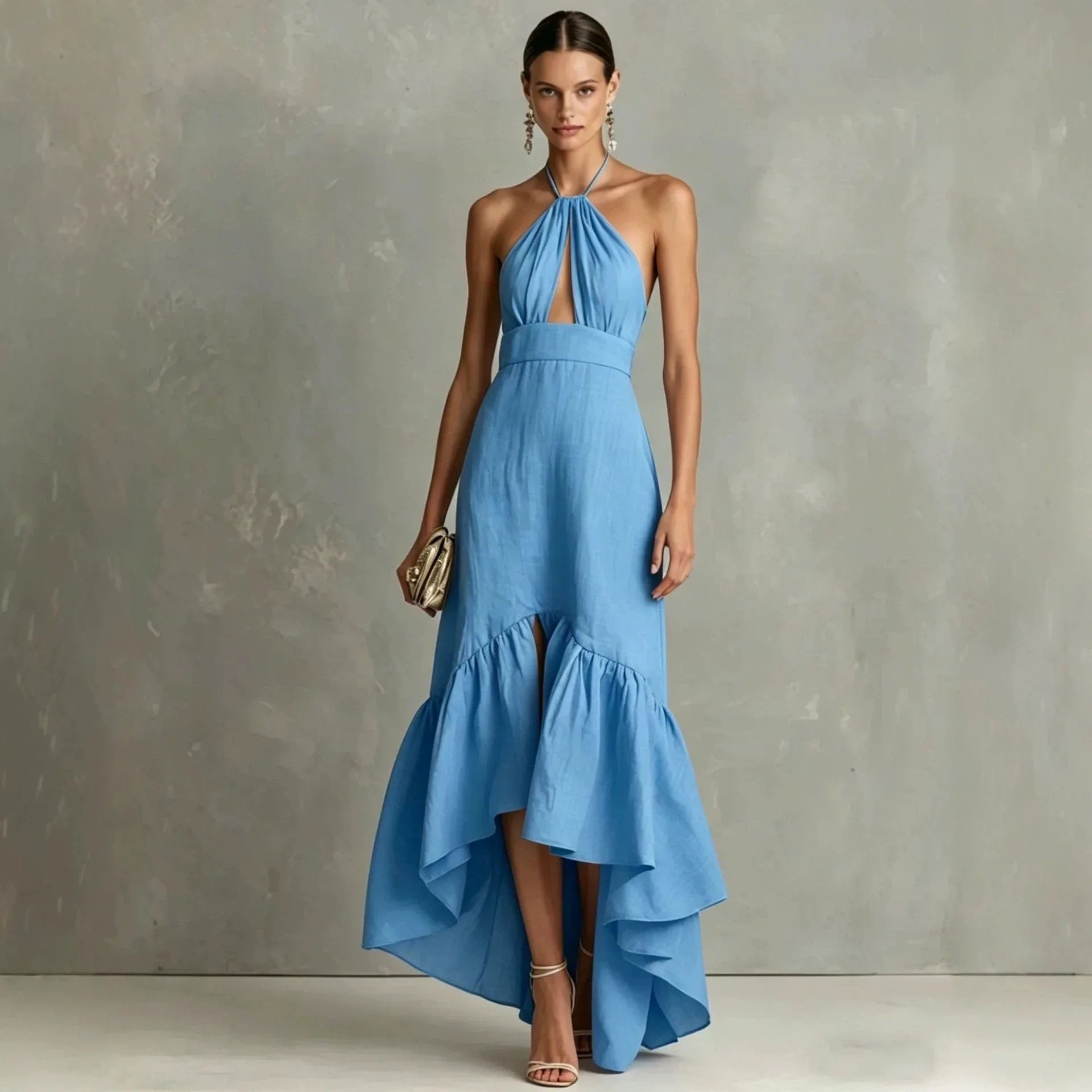 Blue halter maxi dress with keyhole cutout and tiered asymmetric hem