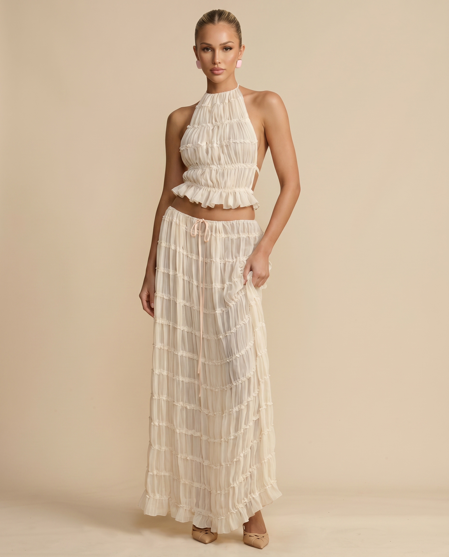Ivory halter crop top and pleated tiered maxi skirt set
