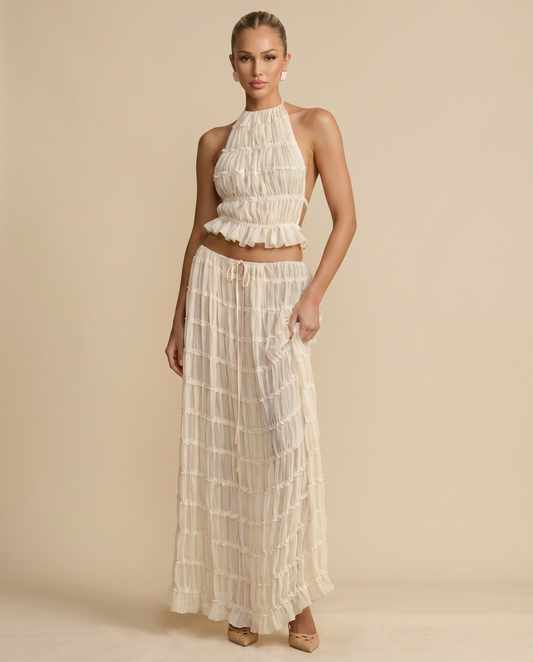 Ivory halter crop top and pleated tiered maxi skirt set