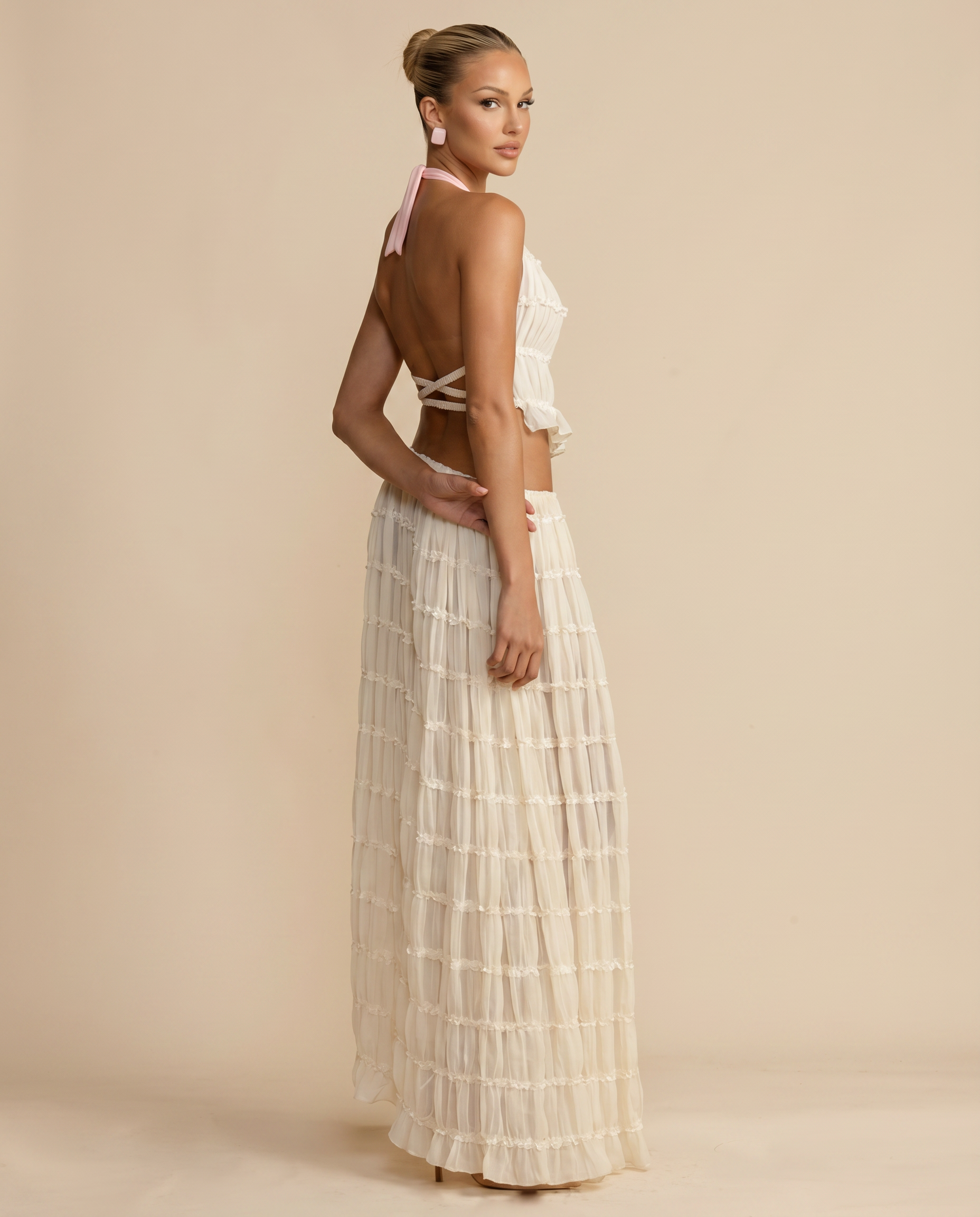 Ivory halter crop top with back tie and pleated tiered maxi skirt set