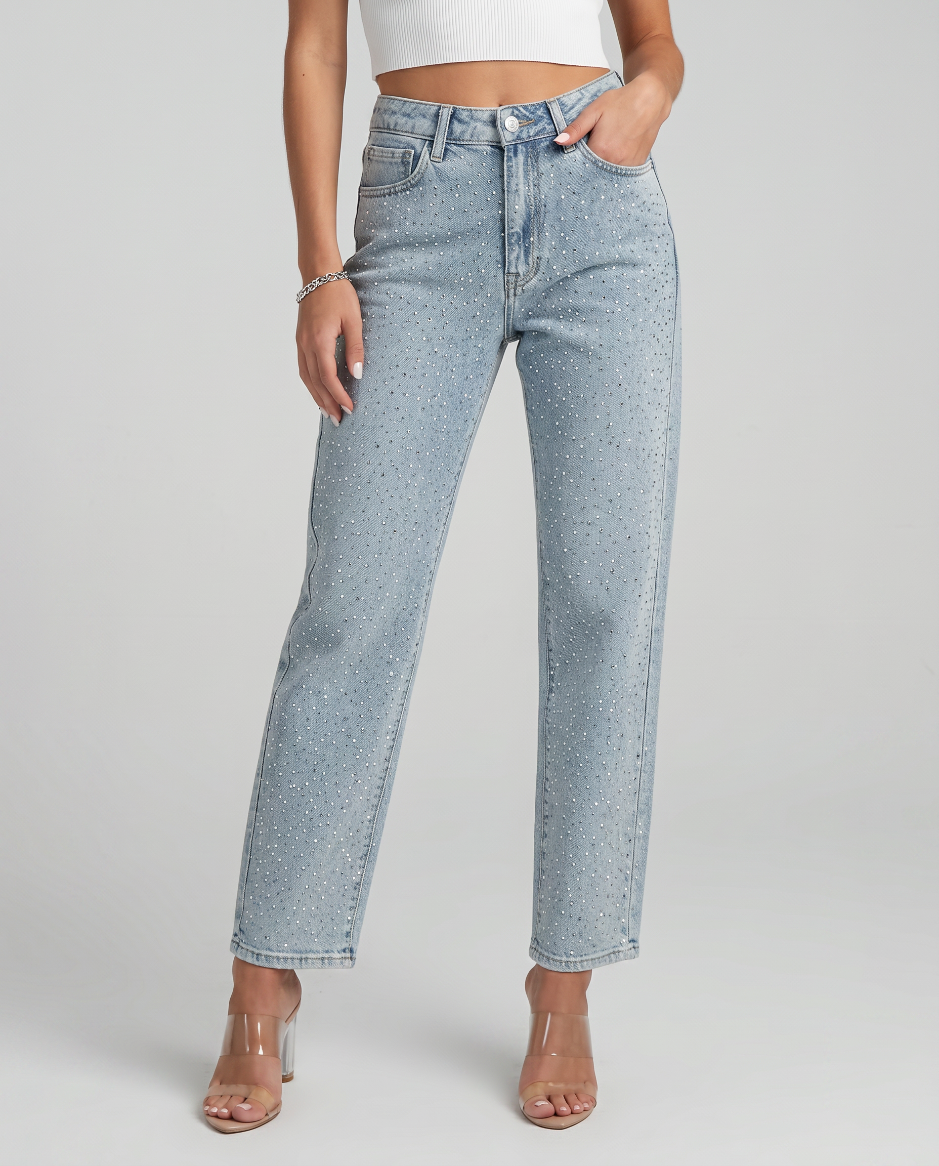 High-waist straight-leg jeans in light blue with subtle shimmer speckles