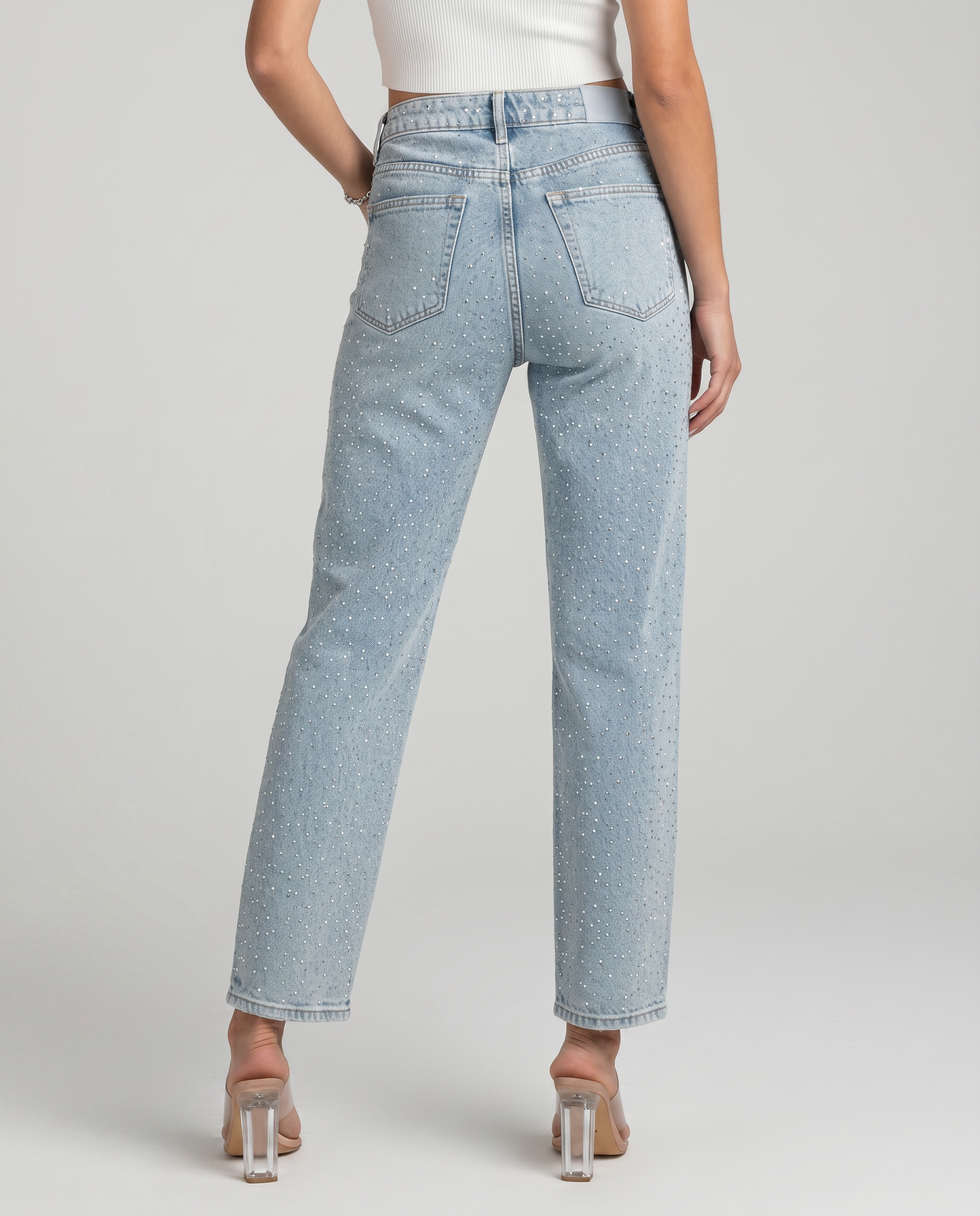 High-waist straight-leg jeans, light blue shimmer speckles, back view