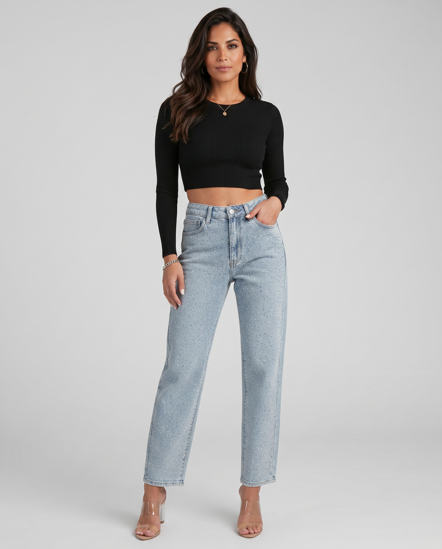 High-waist straight-leg jeans in light blue shimmer speckles, front on model
