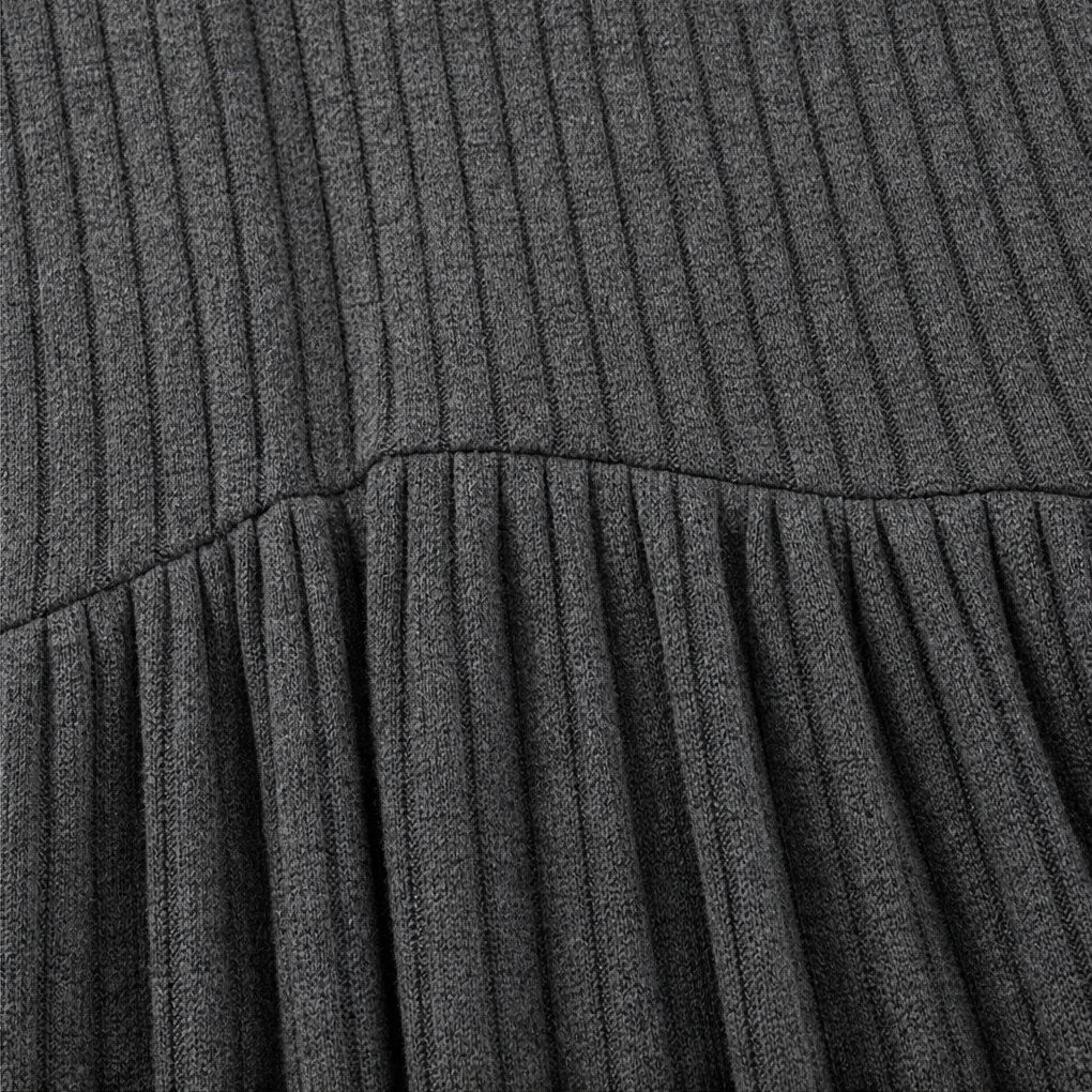 Close-up: gray ribbed knit high-waist seam with gathered skirt section