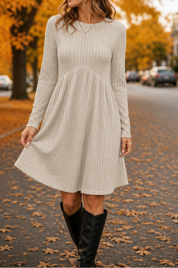 Light beige ribbed knit high-waist A-line midi dress with long sleeves