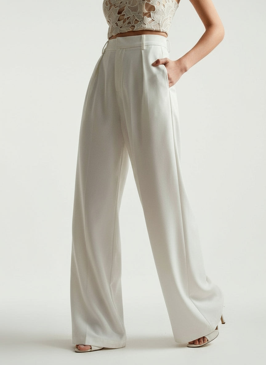 Cream high-waist tailored wide-leg trousers with pleated front and belt loops