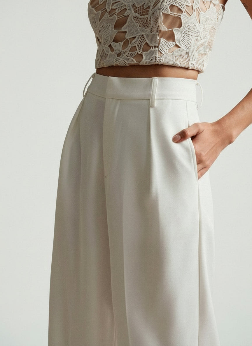 Cream high-waist wide-leg trousers, tailored waistband and side seam detail