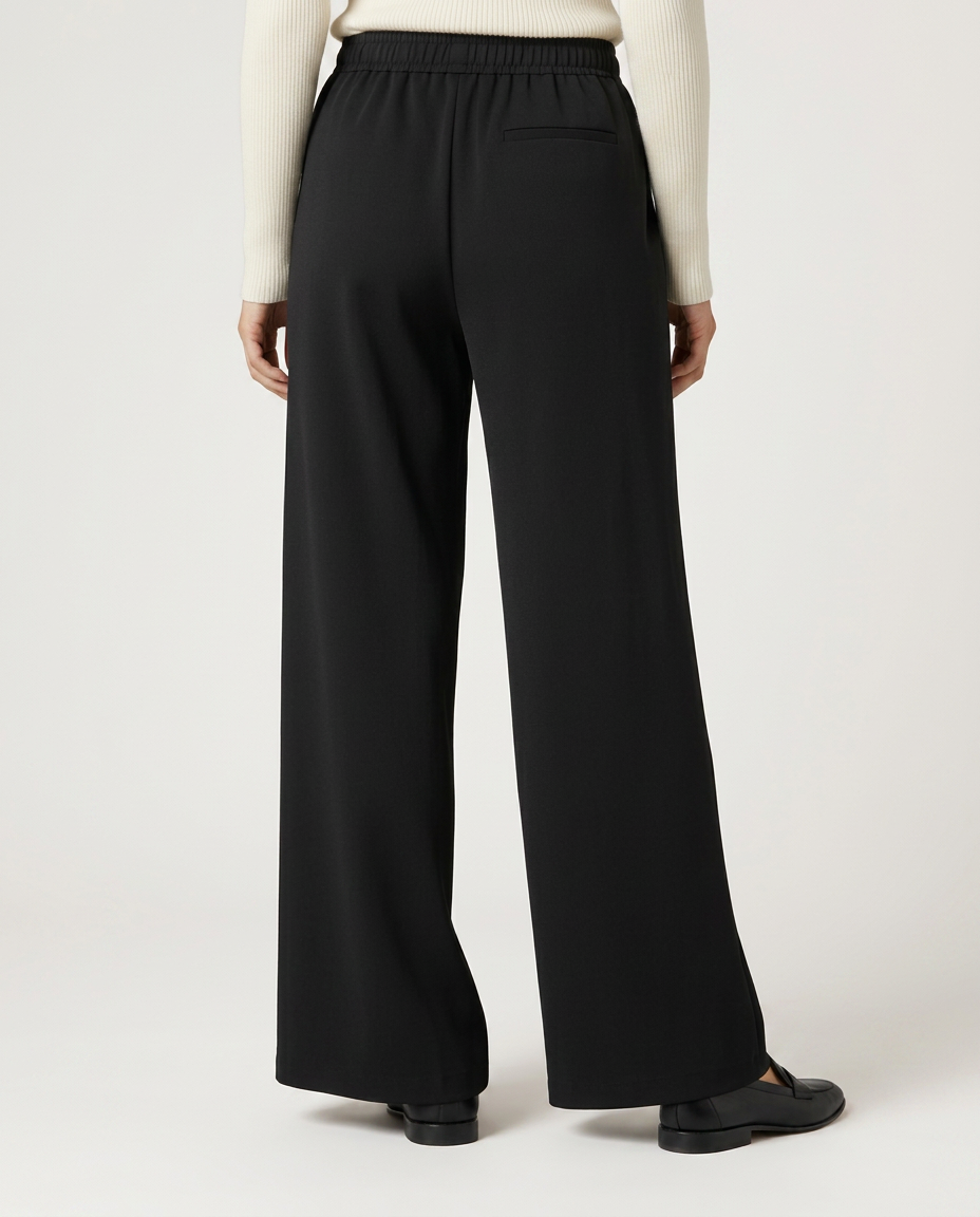 Black high-waist wide-leg trousers with elastic waistband and full-length wide legs