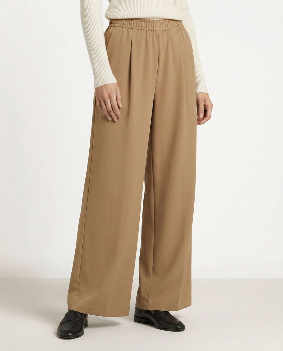 Brown high-waist wide-leg trousers with elastic waistband and relaxed wide legs