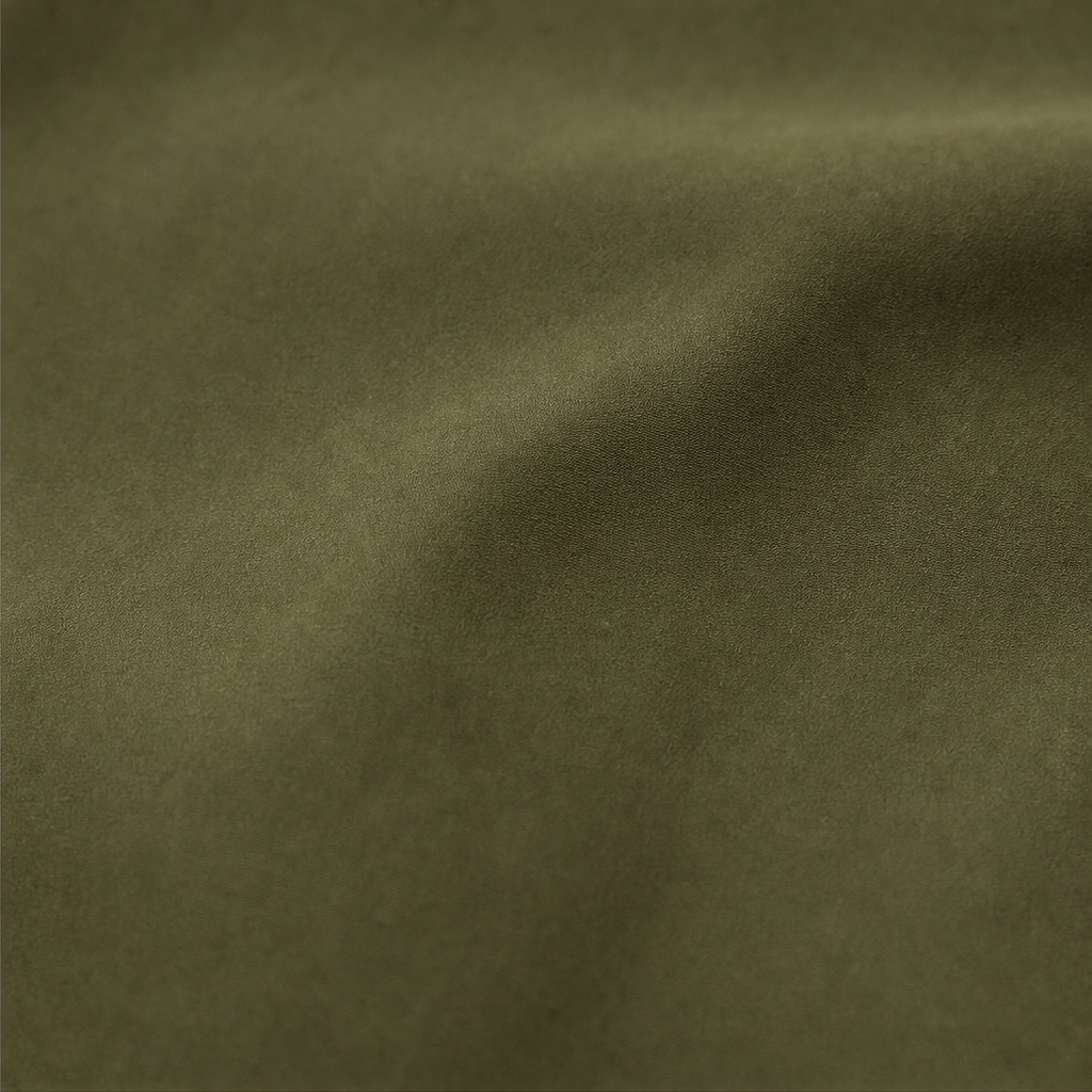 Olive green jacket fabric texture close-up with subtle woven pattern