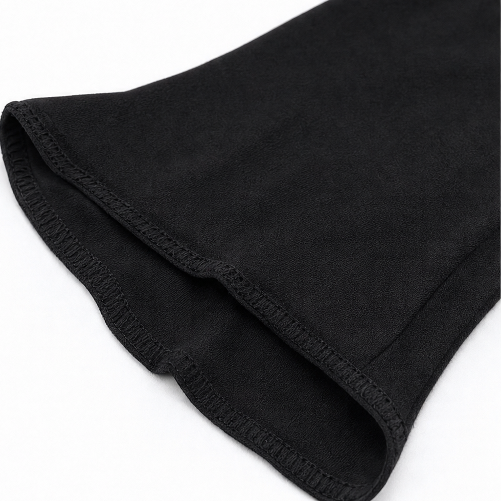 Black knit top folded hem edge with neat topstitching
