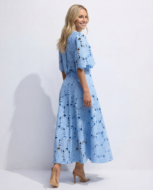 Blue lace crop top and maxi skirt set with floral embroidery, side view