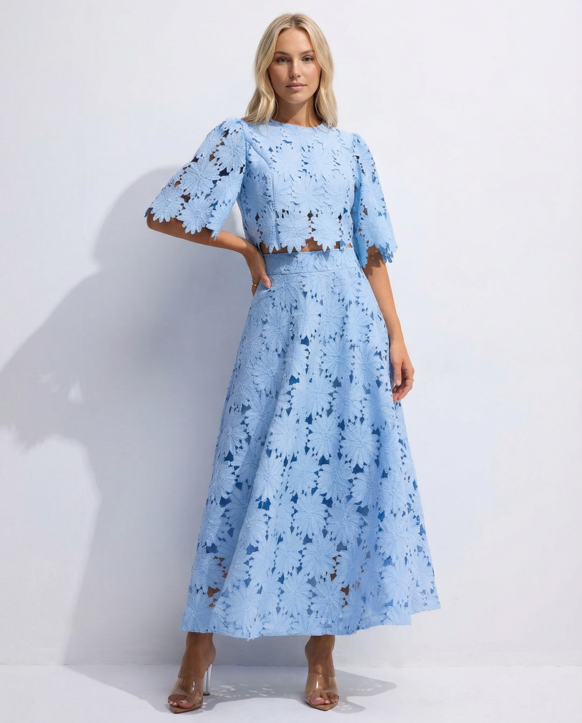 Blue lace crop top and maxi skirt set with floral embroidery, front view