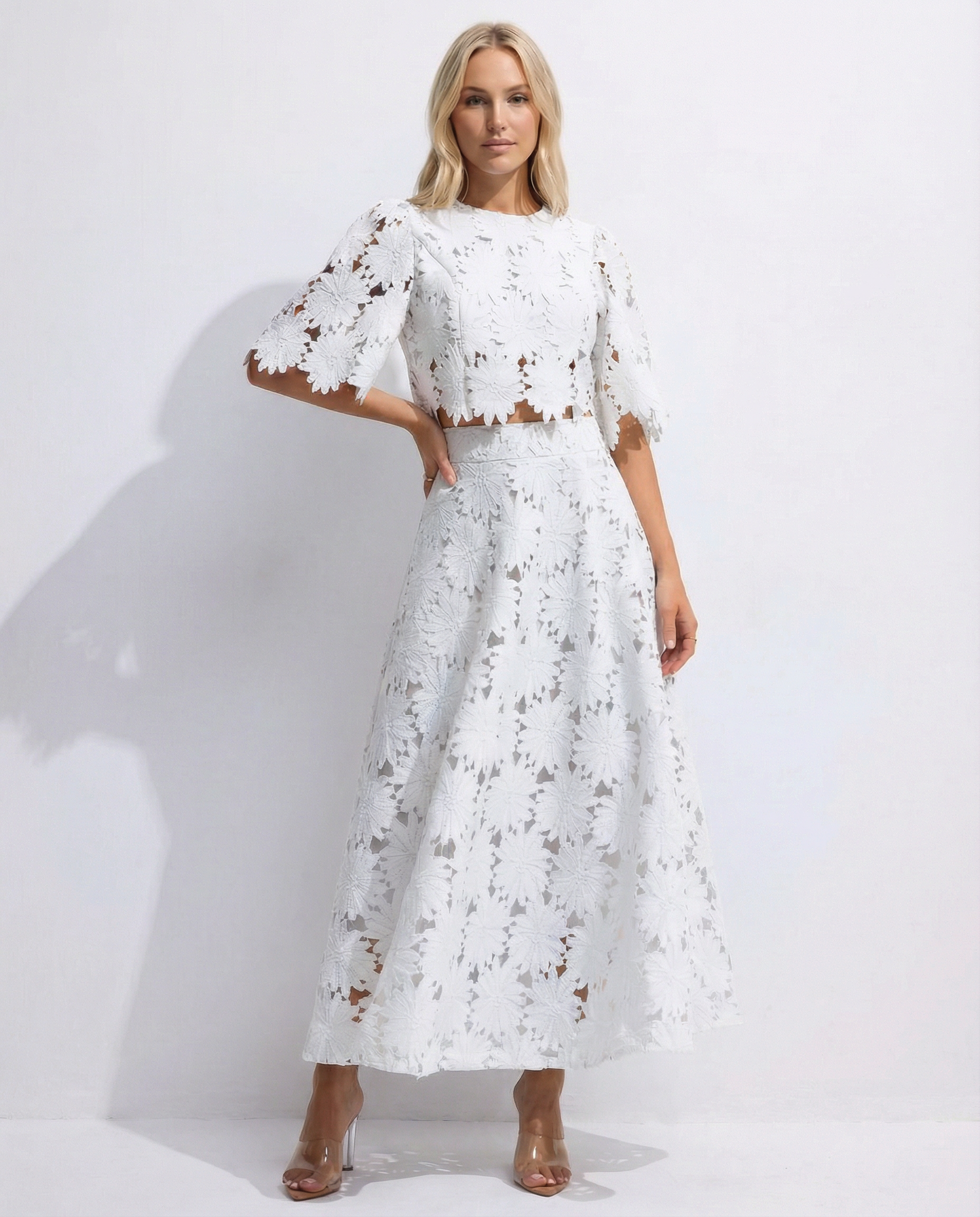 White lace crop top and maxi skirt set with floral embroidery, full front view