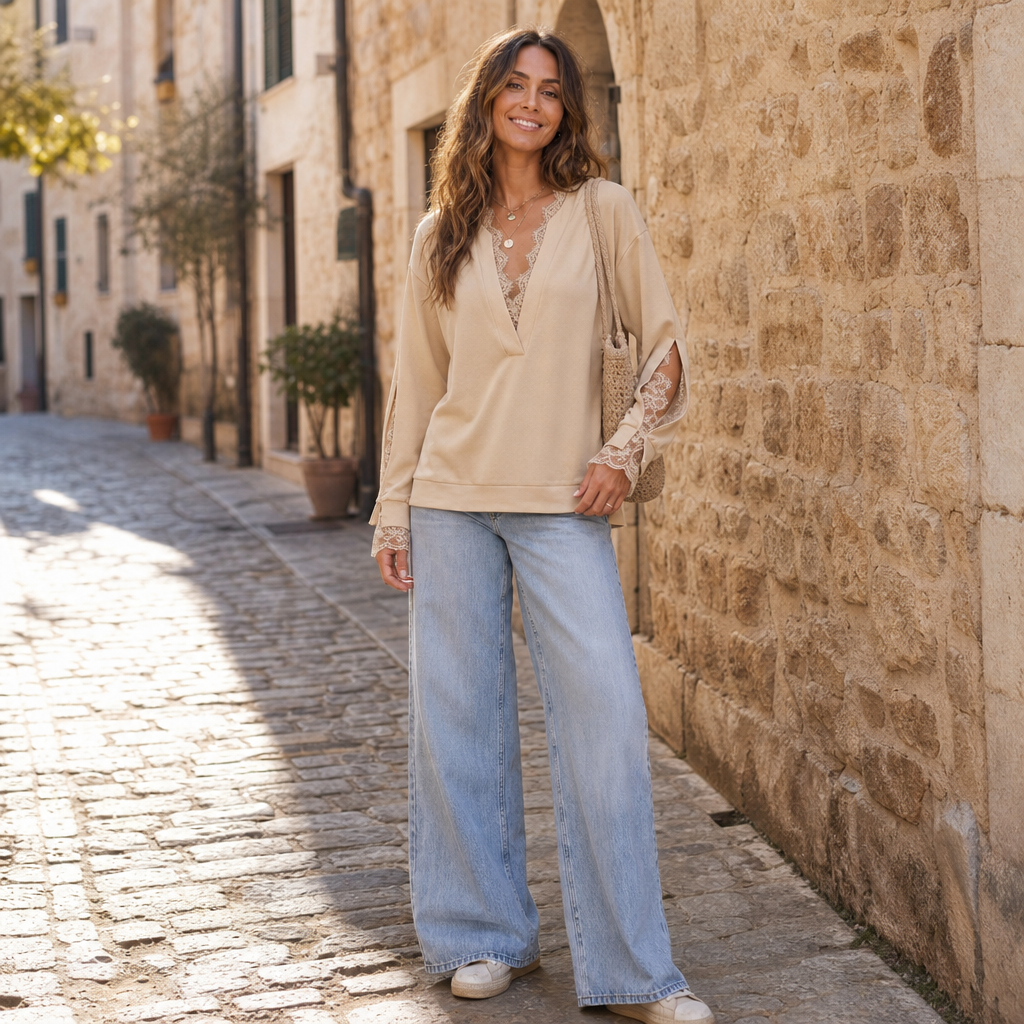 Beige lace-detail blouse with V-neck and long sleeves with lace trim