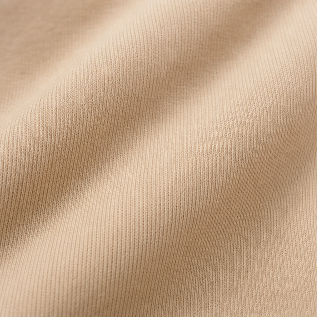 Beige knit fabric panel texture for a lace-detail blouse