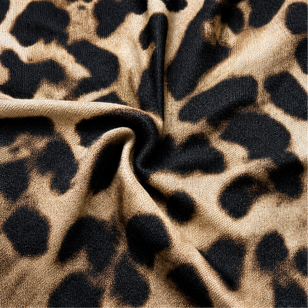 Leopard print fabric close-up in beige and black