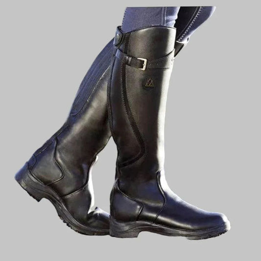 Black leather knee-high boots with outer buckle strap and low block heel