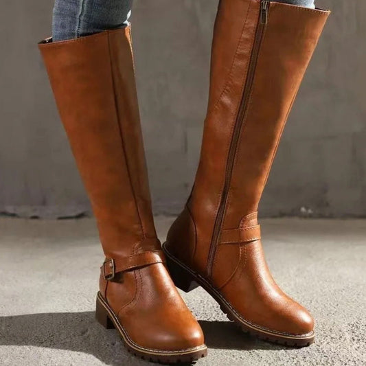 Light brown leather knee-high boots with buckle straps and block heel