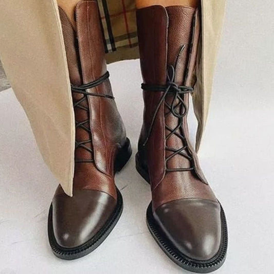 Brown leather lace-up ankle boots with cap toe, full front view