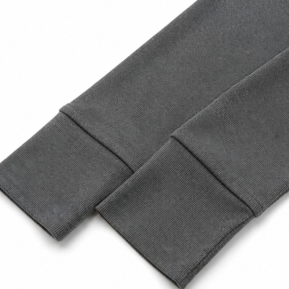 Dark grey waffle knit long sleeve cuffs and hem detail