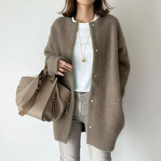 Loose-fit cardigan with button front, long sleeves, gray fuzzy knit.