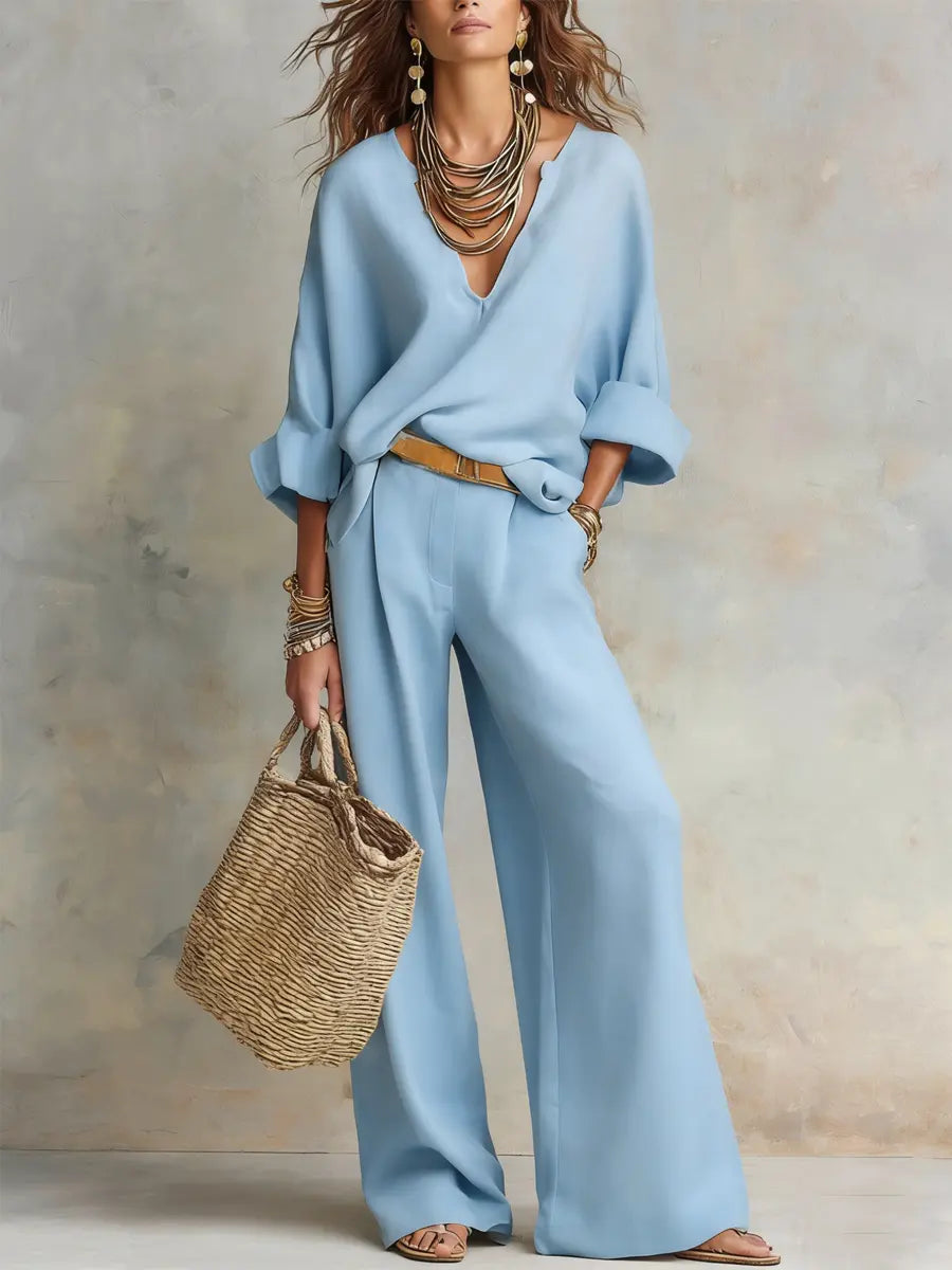 Light blue linen two-piece set with V-neck blouse and wide-leg pants