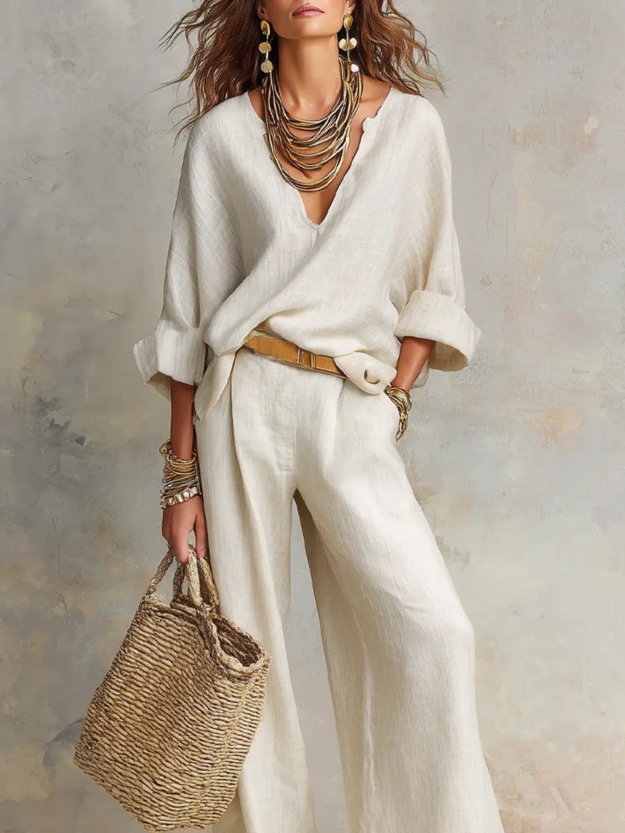 White linen two-piece set with V-neck blouse and wide-leg pants, front view