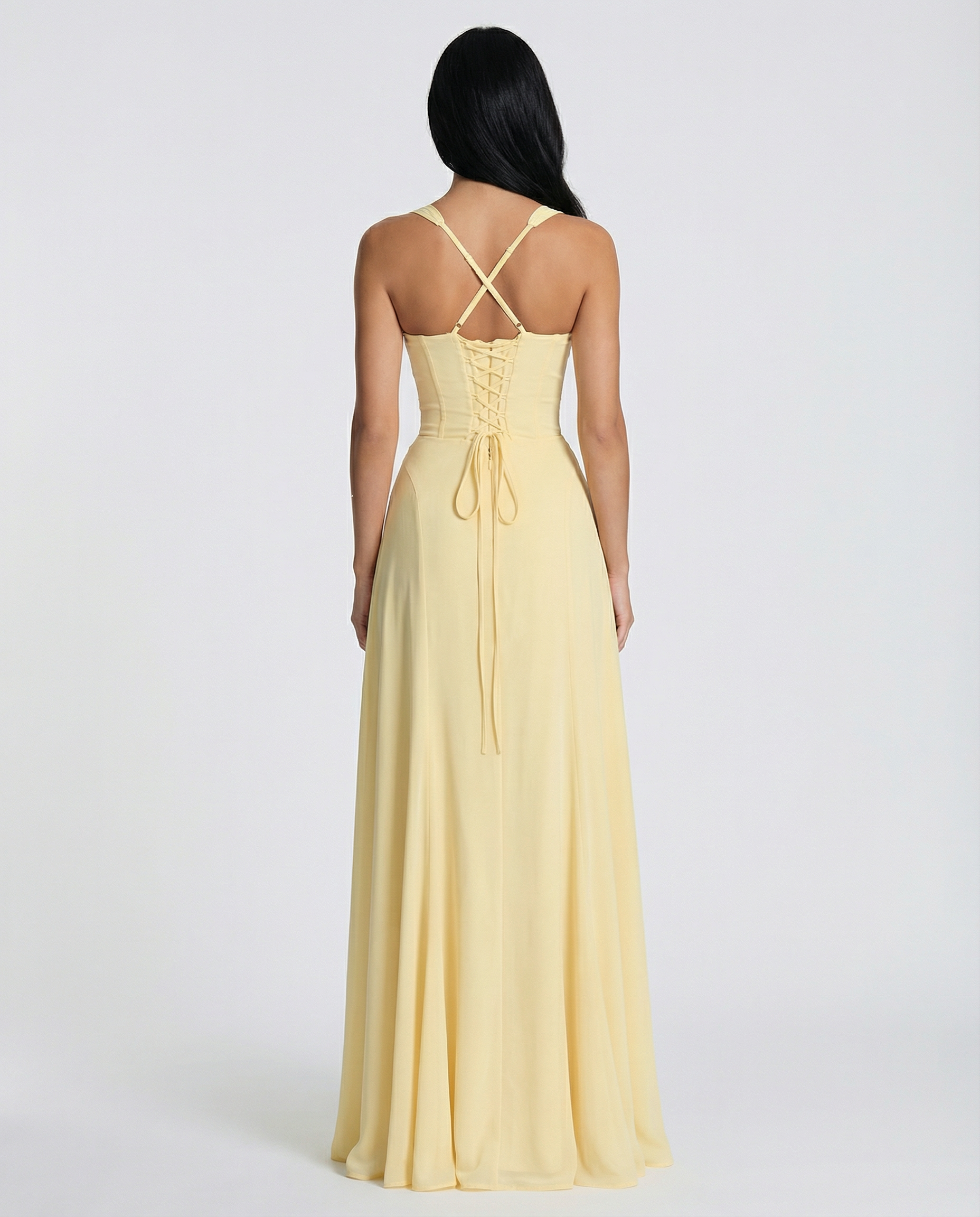 Backless yellow maxi dress with lace-up corset bodice and crisscross straps
