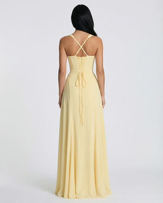 Backless yellow maxi dress with lace-up corset bodice and crisscross straps