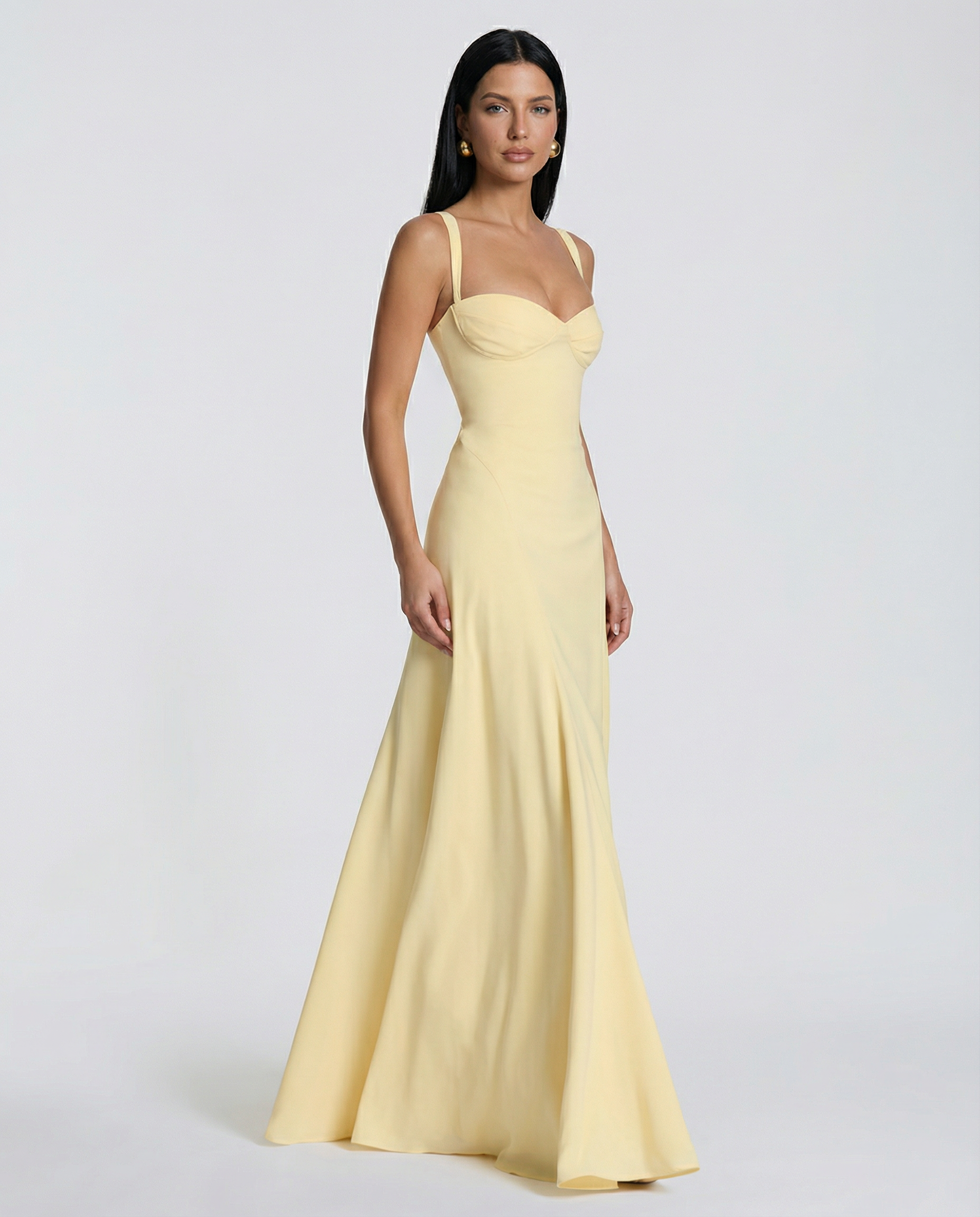 Yellow maxi dress with corset bodice, sweetheart neckline, and fitted skirt